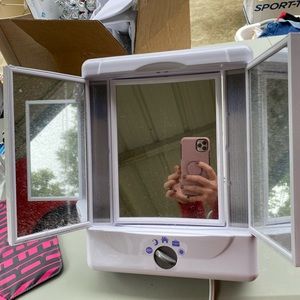 Makeup mirror with lighting